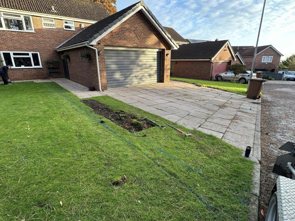 Dign and Shift were called to remove this old concrete paving stone driveway and widen the area in preparation for a new driveway