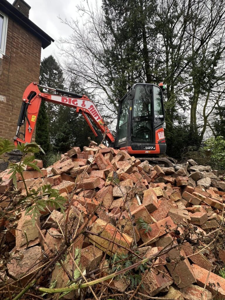 We removed tons of bricks from the site in preparation for a new foundation slab